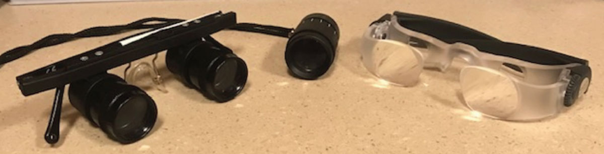 Fig. 2. Left to right: Binocular telescope, monocular telescope and MaxTV glasses for distance enhancement.