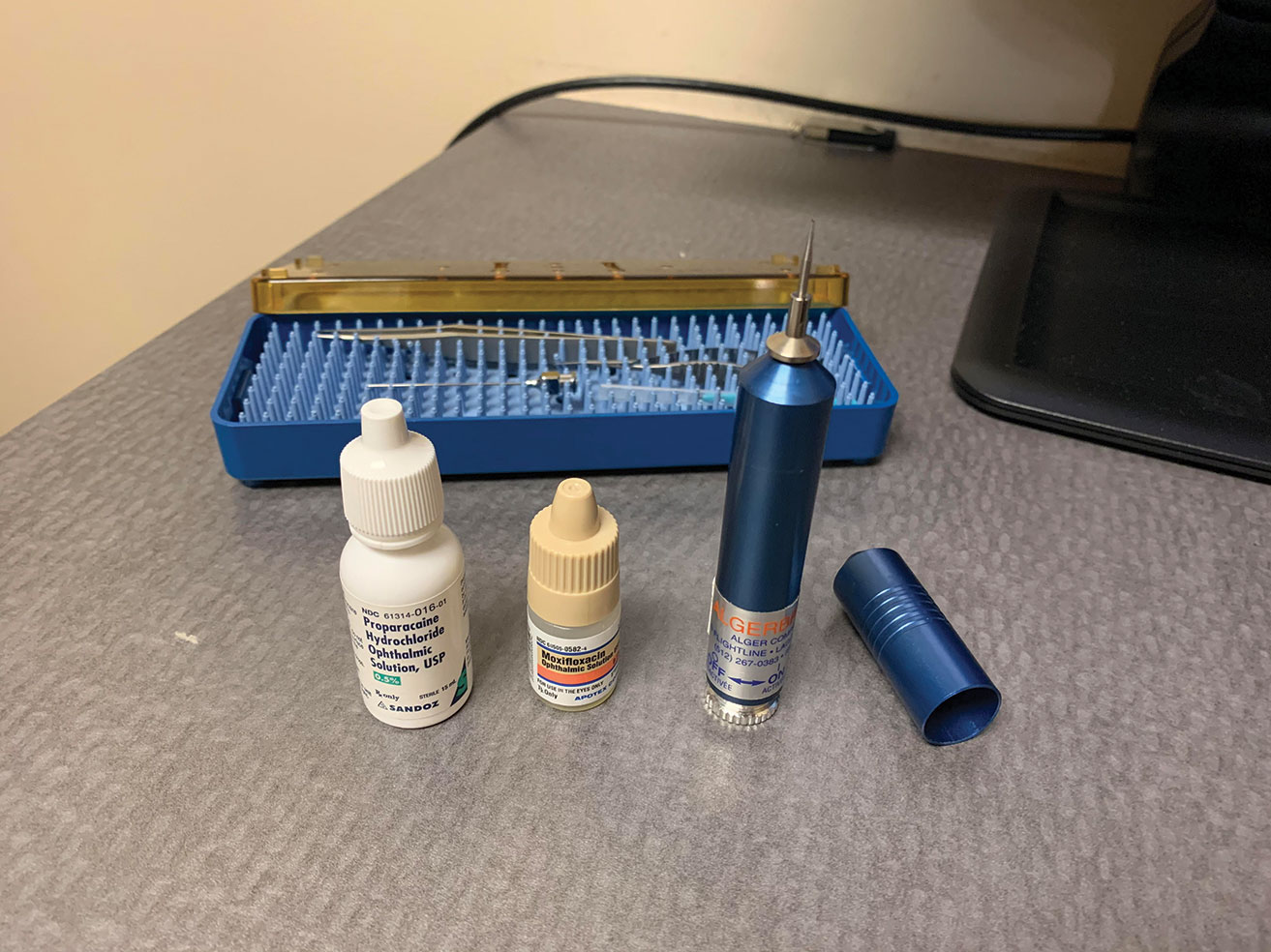 Here is what you will typically need when removing a corneal rust ring with an Alger brush: start with topical proparacaine along with a broad-spectrum topical antibiotic. After the procedure is complete, instill a second drop of antibiotic into the patient’s eye.