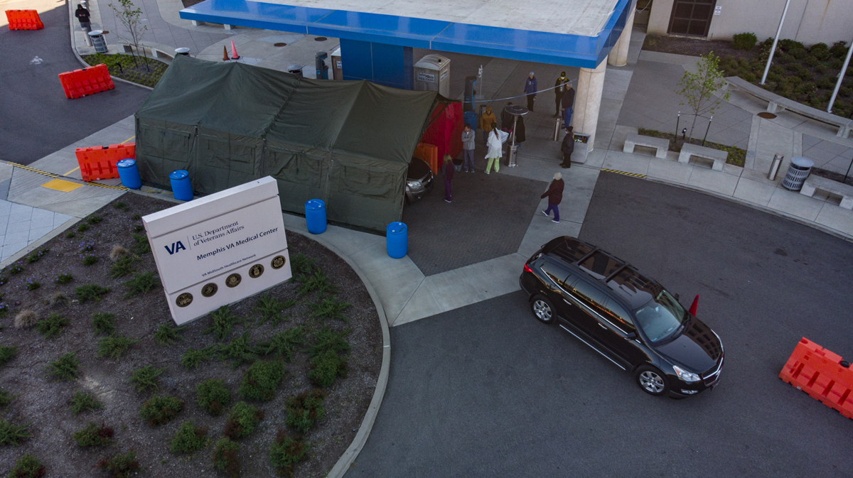This drive-through lab can handle two cars at a time, as blood tests are taken in the tent. 