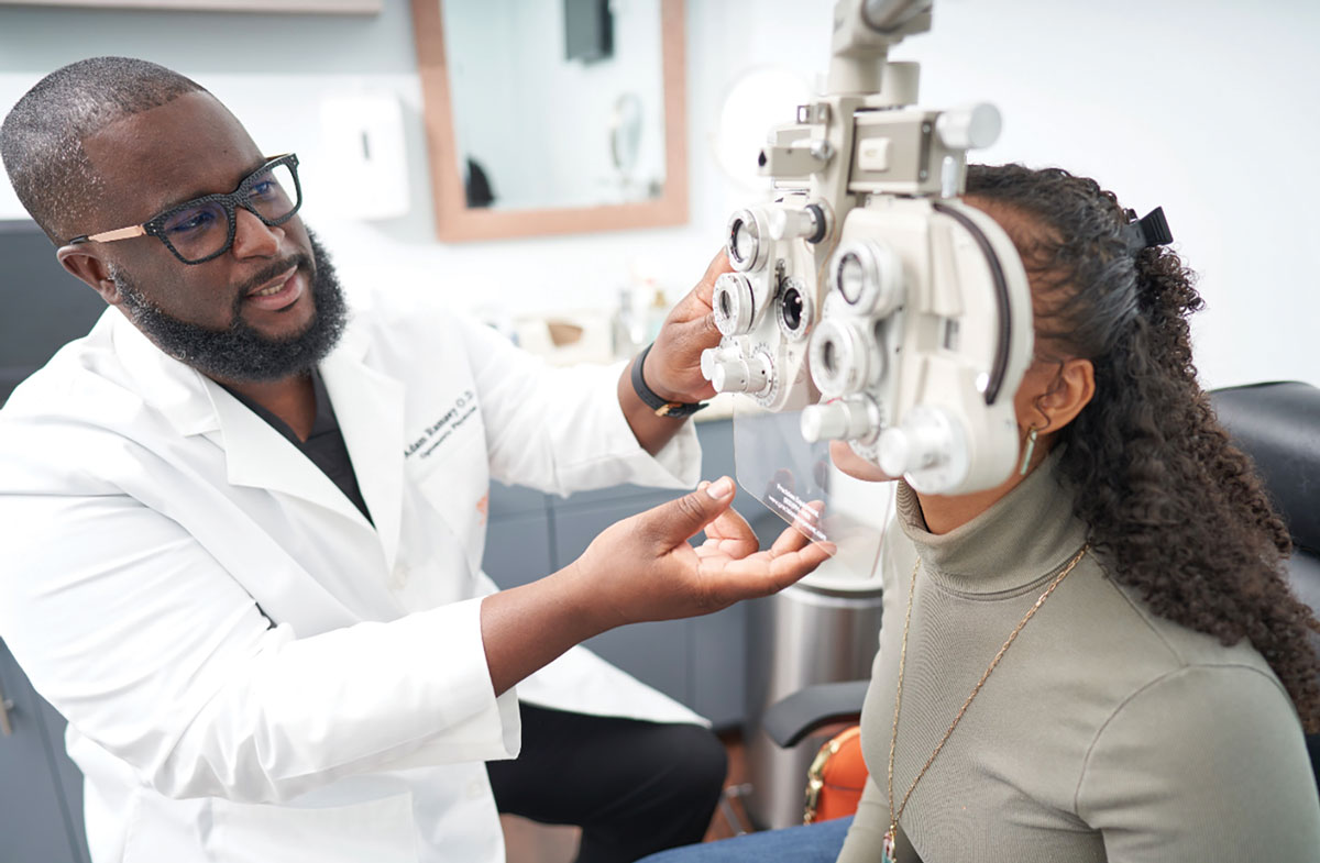 Adam Ramsey, OD, co-founder of Black EyeCare Perspective (BEP), treats a patient at his practice in West Palm Beach, FL.