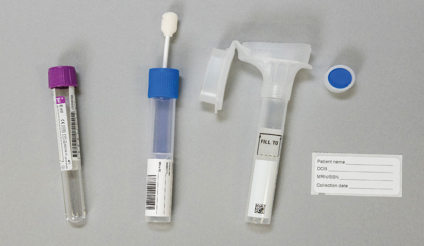 Whole blood, buccal swab and saliva sample collection tubes.